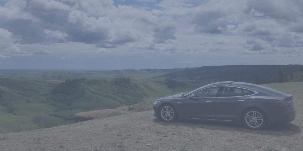 grey tesla model S on hill